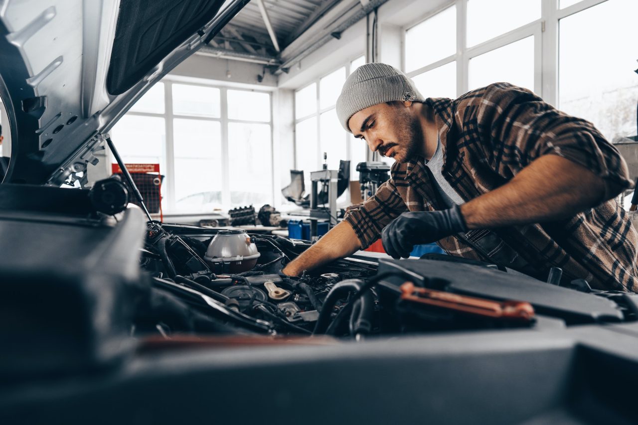 mechanic working on a car in the garage